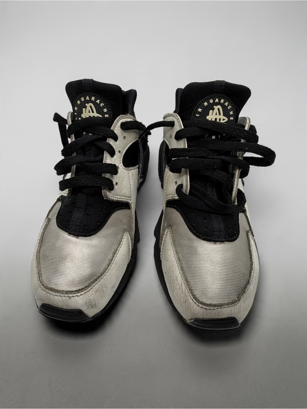 Nike Men’s Silver and Black Air Huarache Sneakers